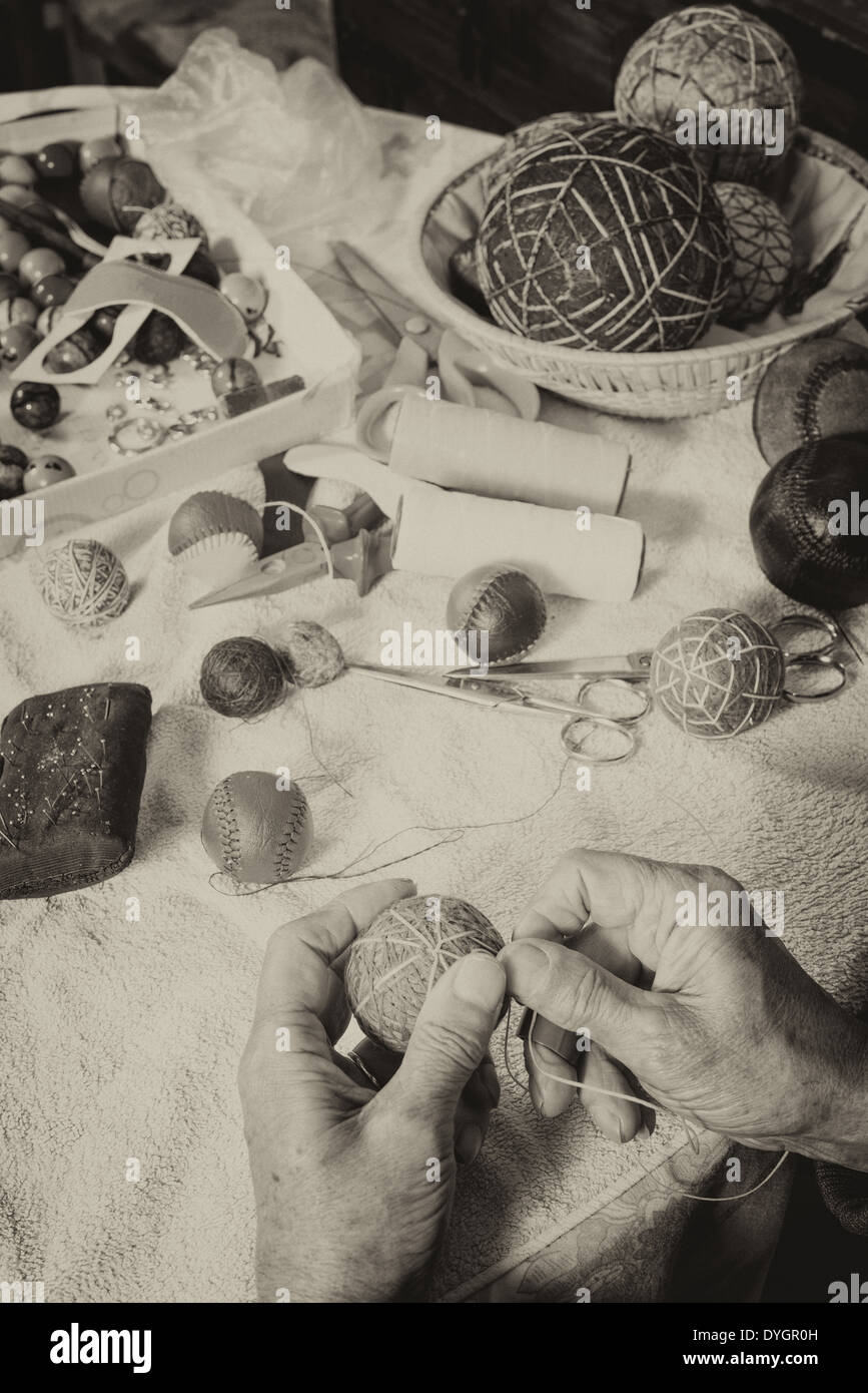 Coudre les mains Banque D'Images