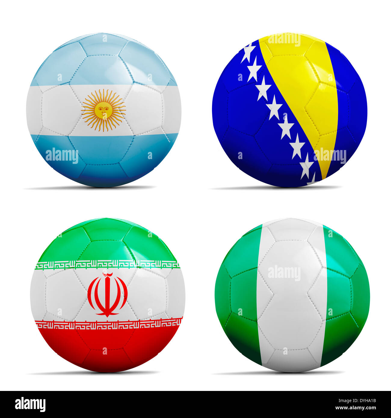 Quatre ballons de foot avec les équipes du groupe F, le Brésil 2014 Drapeaux Football. Banque D'Images