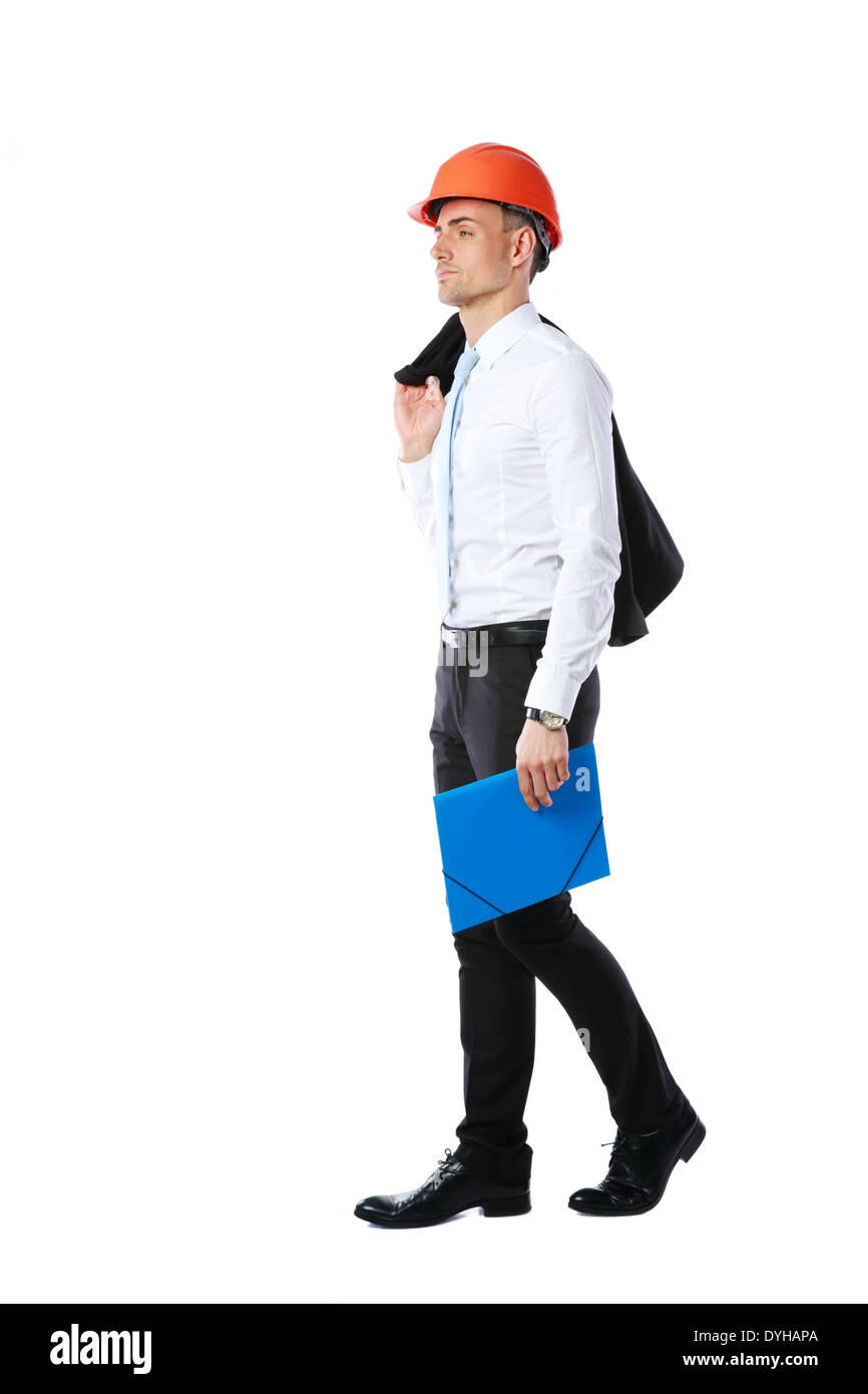 Pensive businessman en casque avec dossier bleu sur fond blanc Banque D'Images