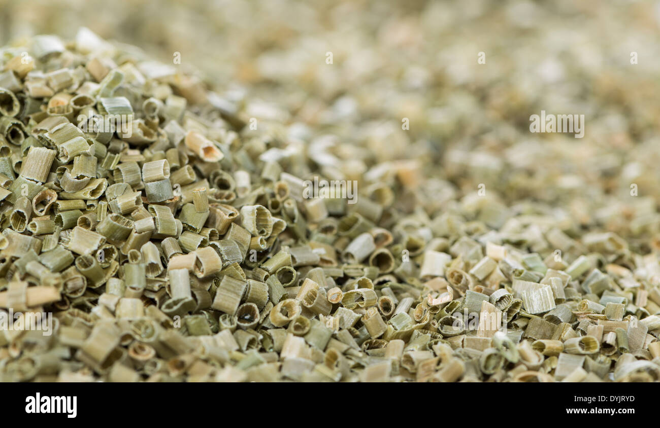 La ciboulette séchée de droit pour l'utilisation d'arrière-plan ou comme texture Banque D'Images