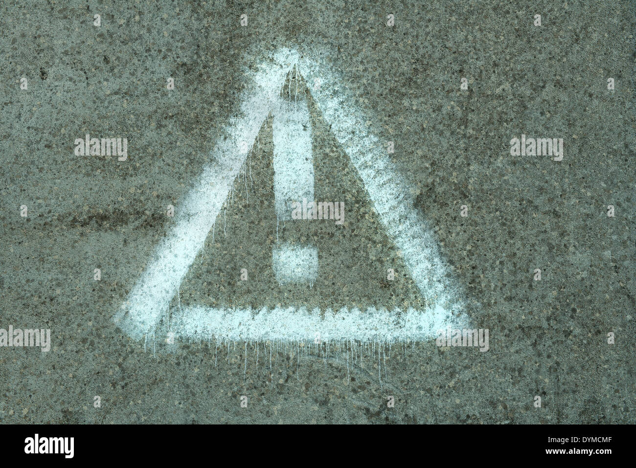 Symbole de danger sur le mur Banque D'Images