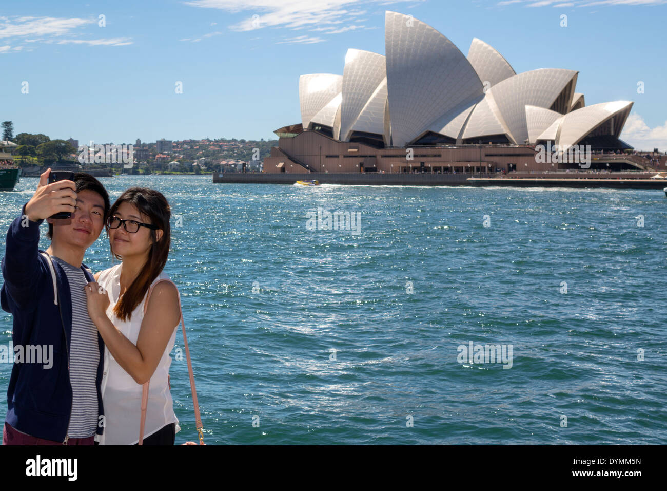 Sydney Australie,Circular Quay,Sydney Harbour,Harbour,Opera House,ferry,ferries,Parramatta River,eau,femme asiatique femme femme femme,homme homme homme,couple,pos Banque D'Images