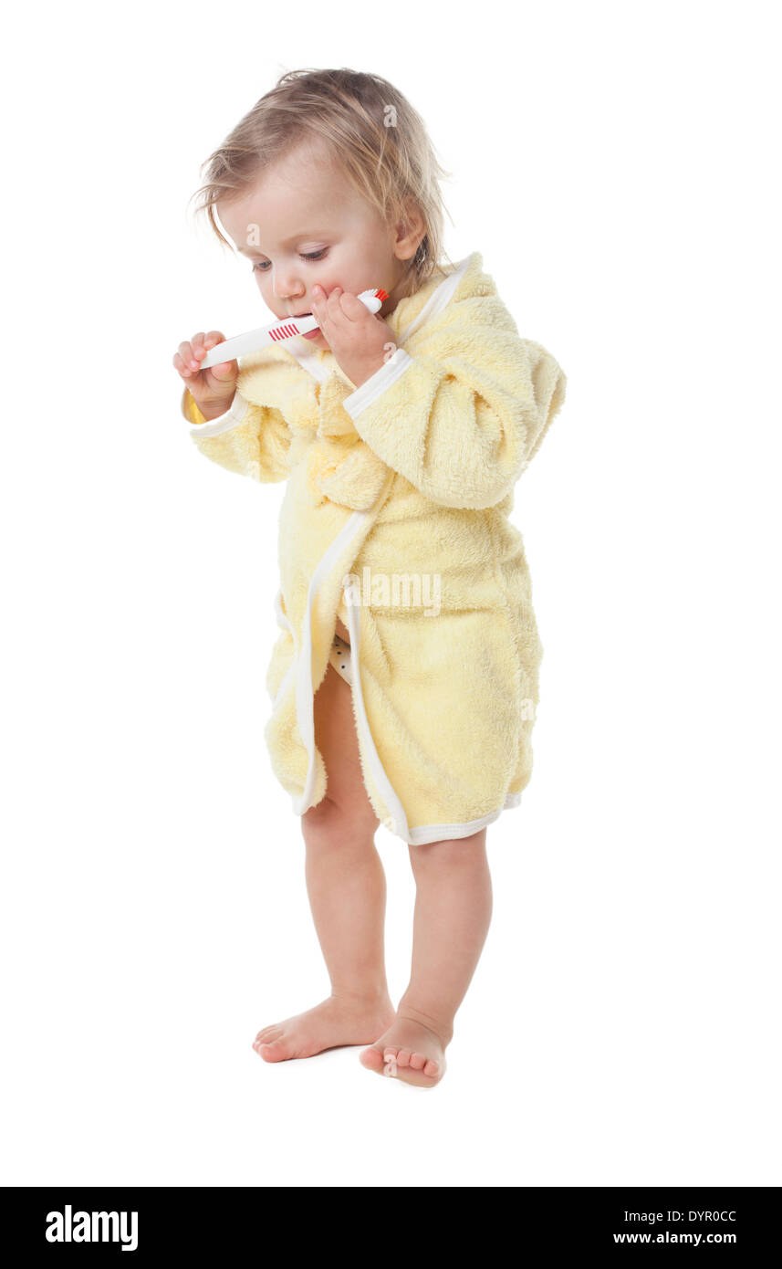 Petite fille se brosser les dents isolées Banque D'Images