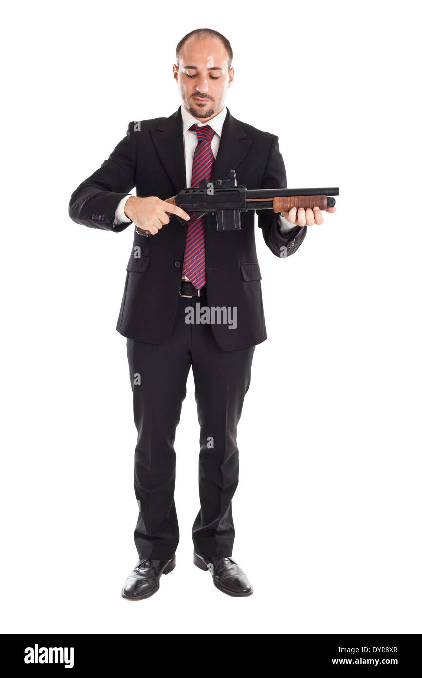 Un homme debout et tenant un fusil Banque D'Images