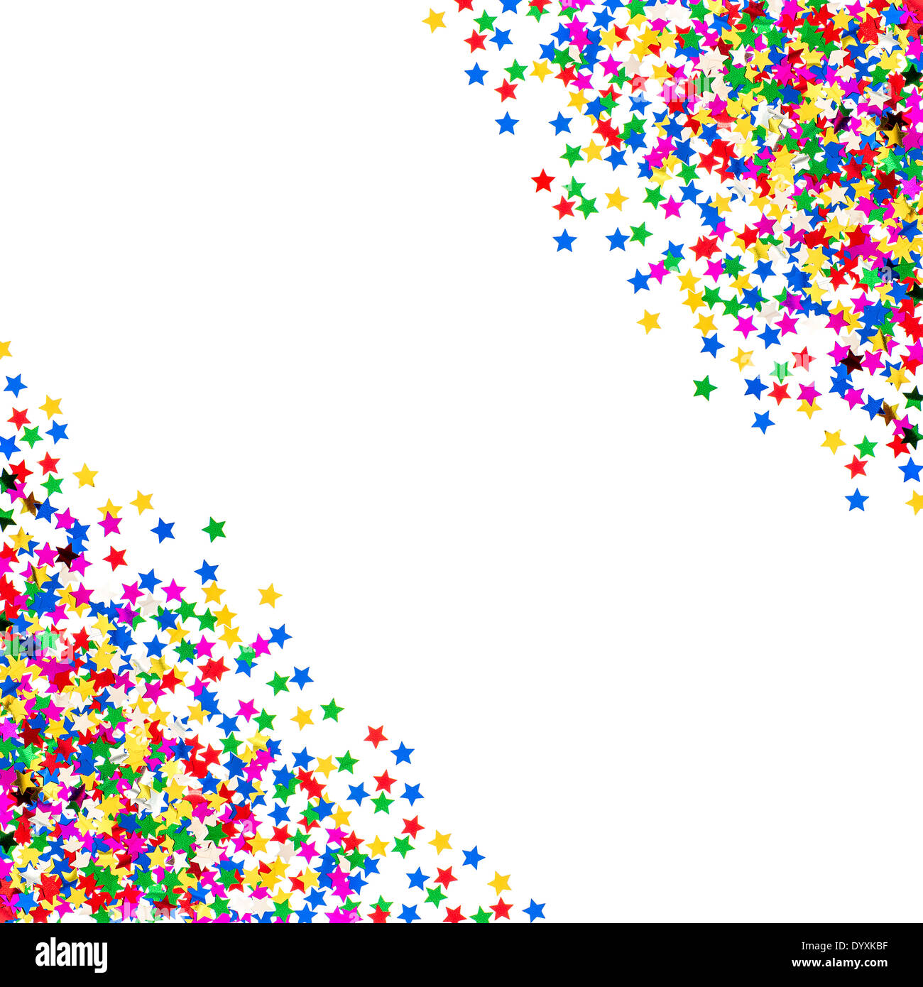 Confettis en forme d'étoile de couleur. rouge, bleu, vert, jaune fond fêtes. Banque D'Images