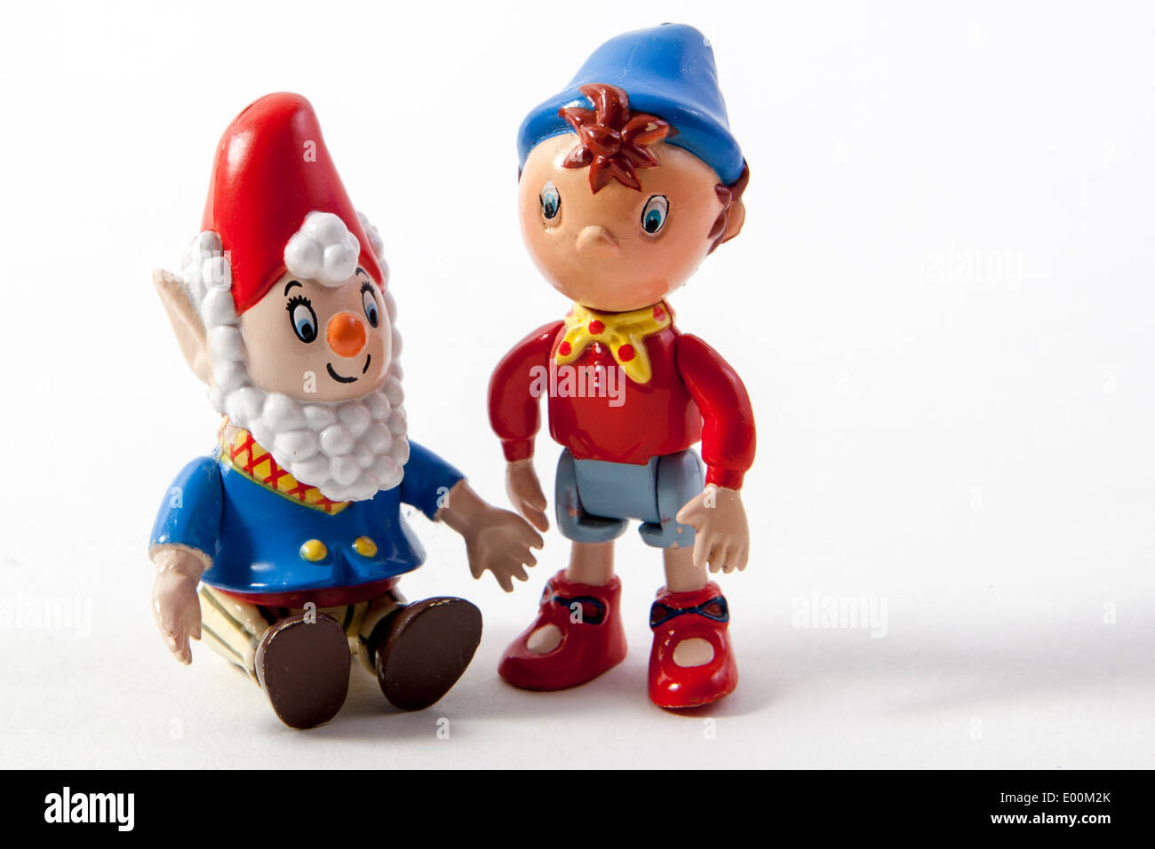 Jouets sur un fond blanc. Oui-oui et les grandes oreilles de l'Enid Blyton livres. Banque D'Images