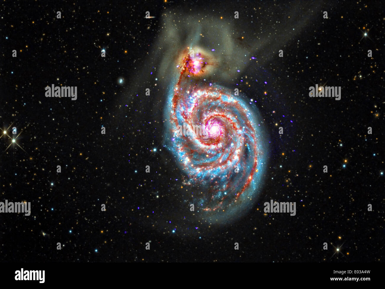 Galaxie spirale appelée M51, qui se trouve à environ 30 millions d'années-lumière de la Terre est dans le processus de fusion avec une plus petite galaxie vu à sa partie supérieure gauche capturés par le télescope spatial Chandra. Credit : Planetpix/Alamy Live News Banque D'Images