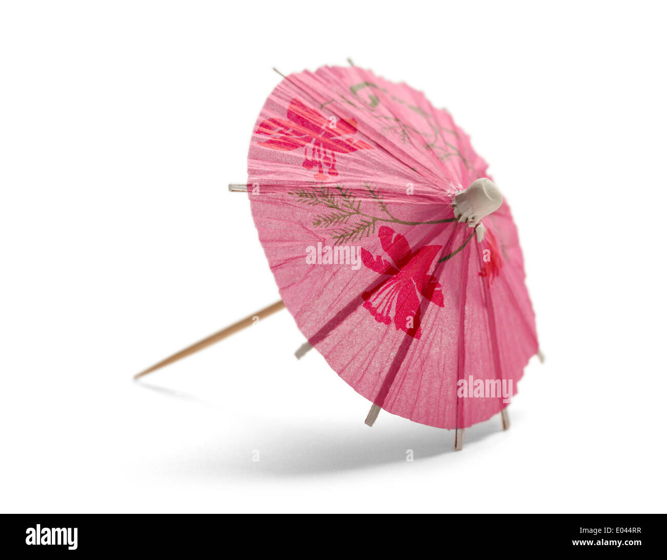 Parapluie Cocktail rose isolé sur fond blanc. Banque D'Images