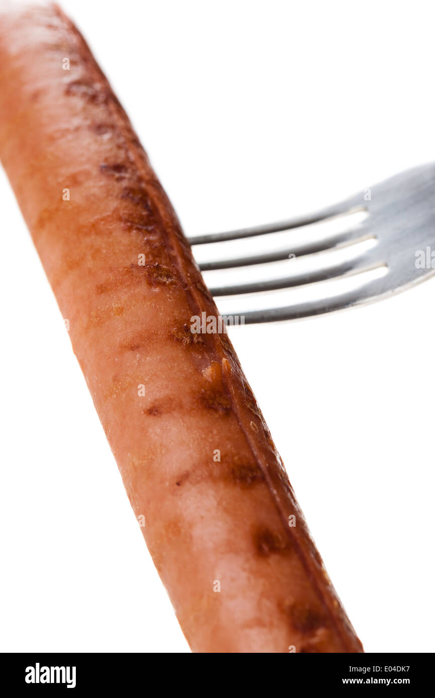 Un délicieux saucisson sur une fourchette over white Banque D'Images