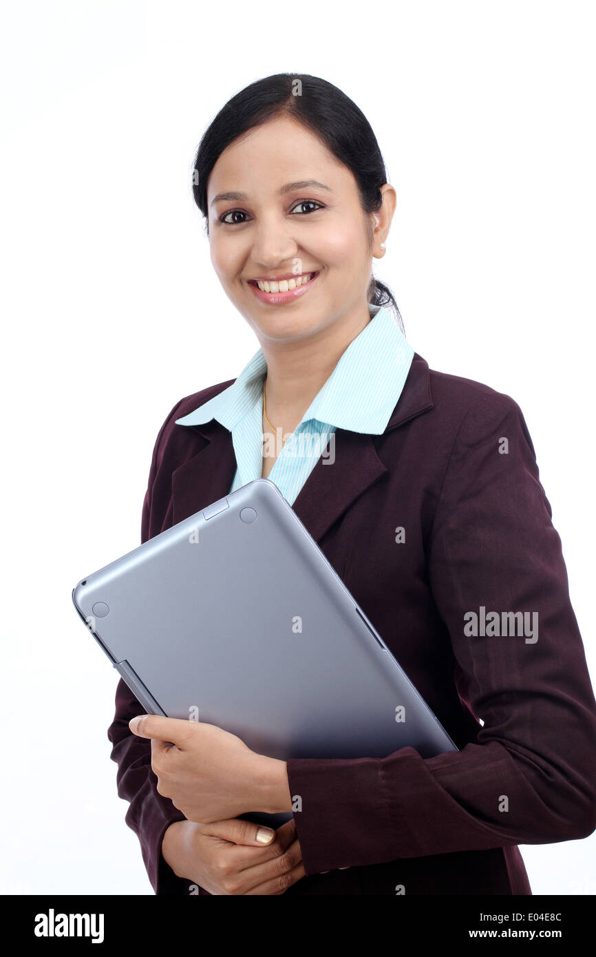 Happy young business woman with tablet against white background Banque D'Images