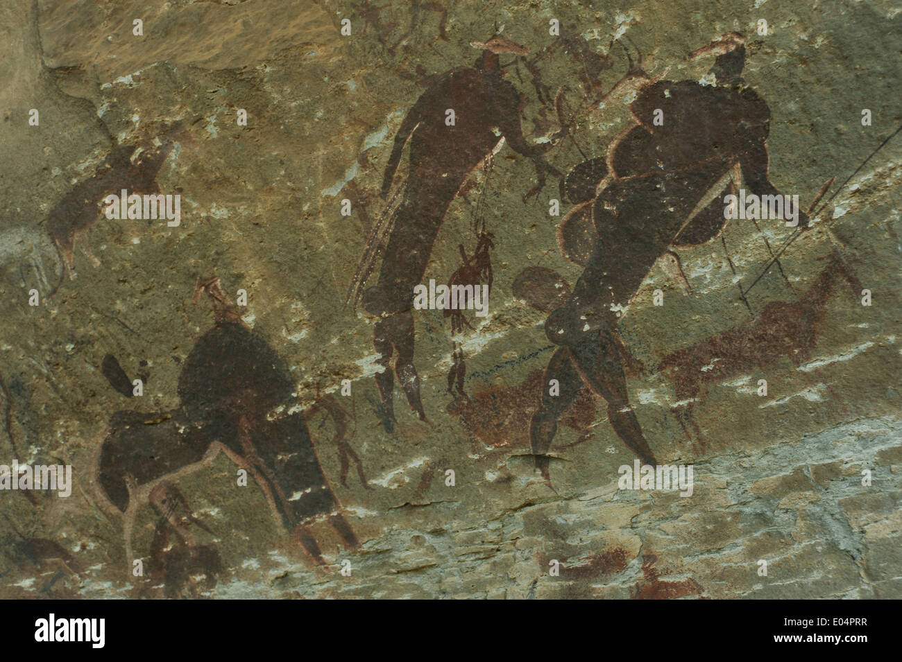 La réserve naturelle du Château des géants, KwaZulu-Natal, Afrique du Sud, héliotropes, résumé, figurines d'art rupestre San Bushman sur Grotte de grès mur, Close up Banque D'Images