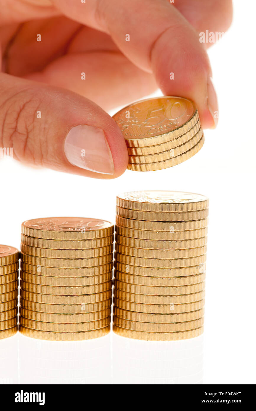 Certaines piles de pièces d'euro d'argent sur fond blanc, Einige Stapel von Euro Geld auf weissem Hintergrund muenzen Banque D'Images