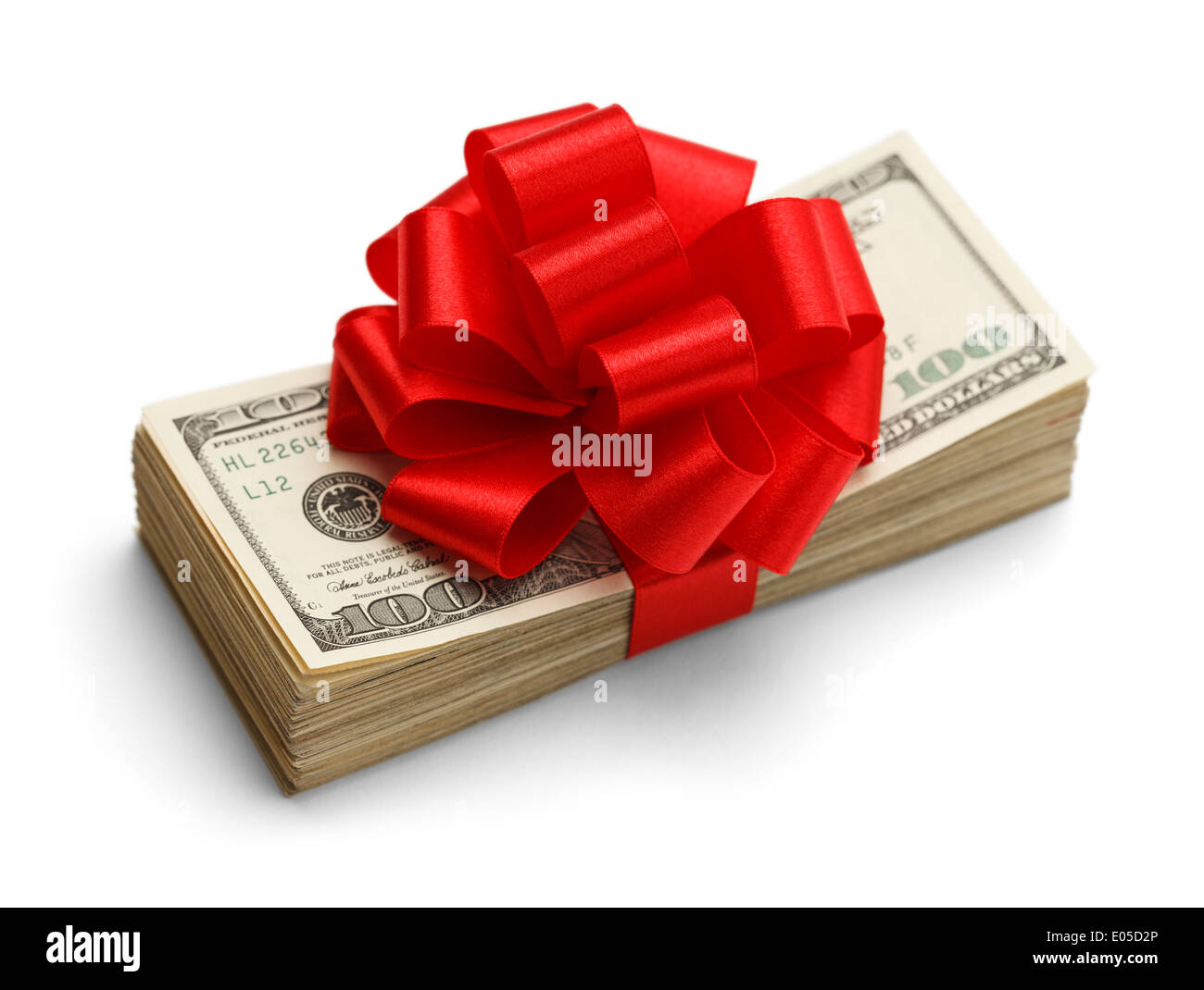 Prime de Noël Cadeau présent pile d'argent comptant cent Dollar US Factures avec arc rouge isolé sur fond blanc. Banque D'Images