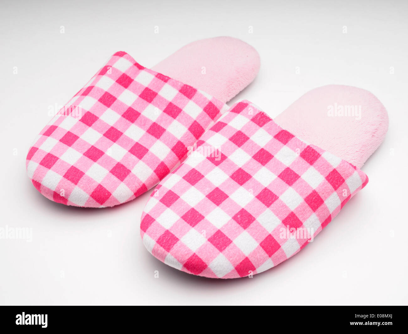 Chaussons rose cut out isolé sur fond blanc Banque D'Images