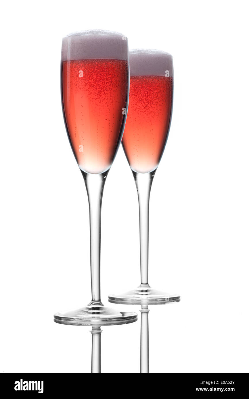 Champagne rose rétro sur fond blanc Banque D'Images