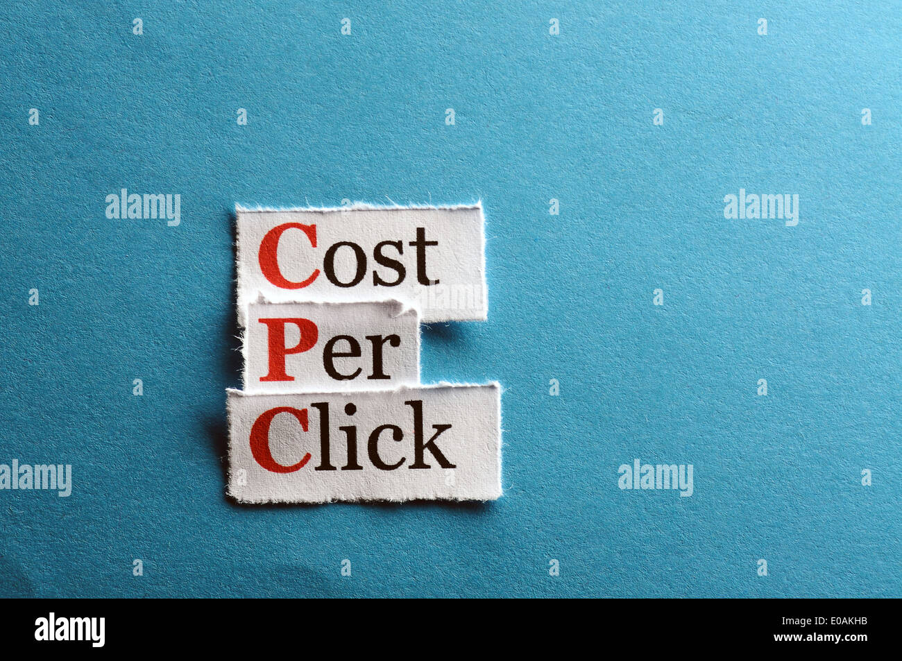 CPC, coût par clic sur papier bleu Banque D'Images