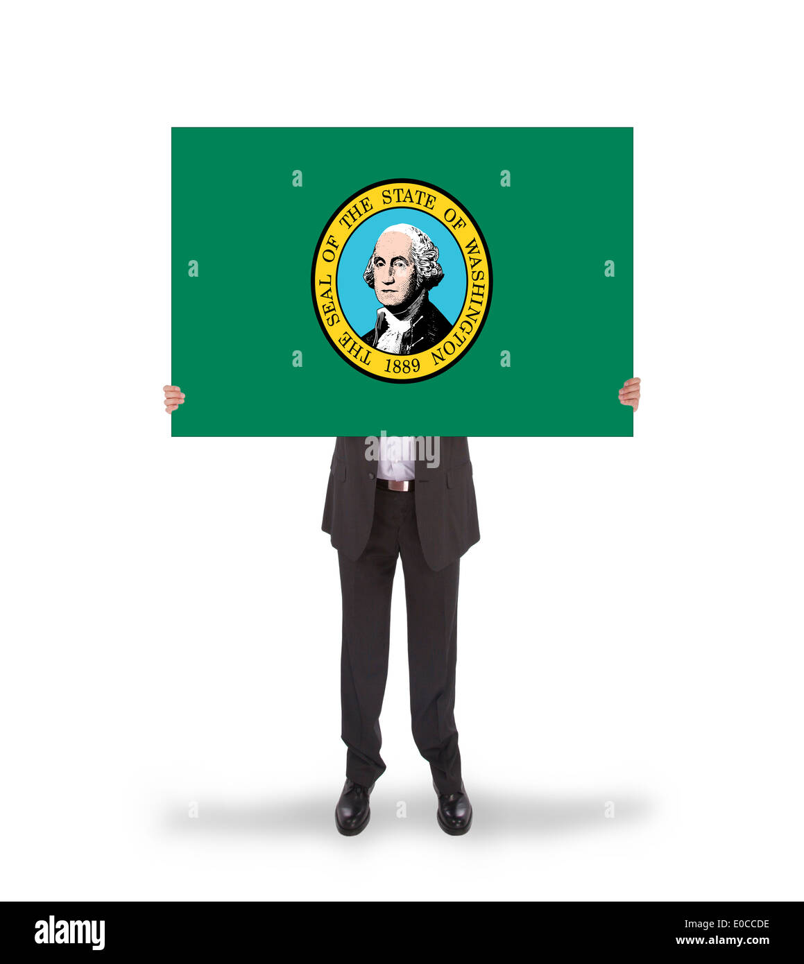 Smiling businessman holding un grand drapeau carte de Washington isolated on white Banque D'Images