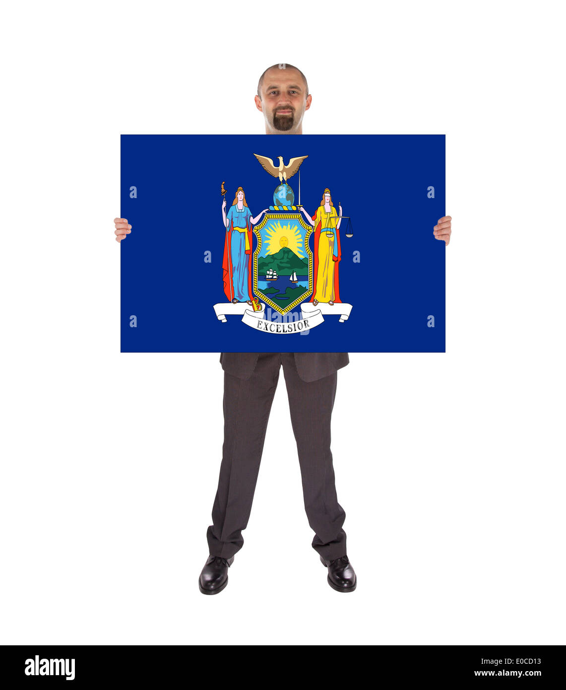 Smiling businessman holding un grand drapeau carte de New York isolated on white Banque D'Images