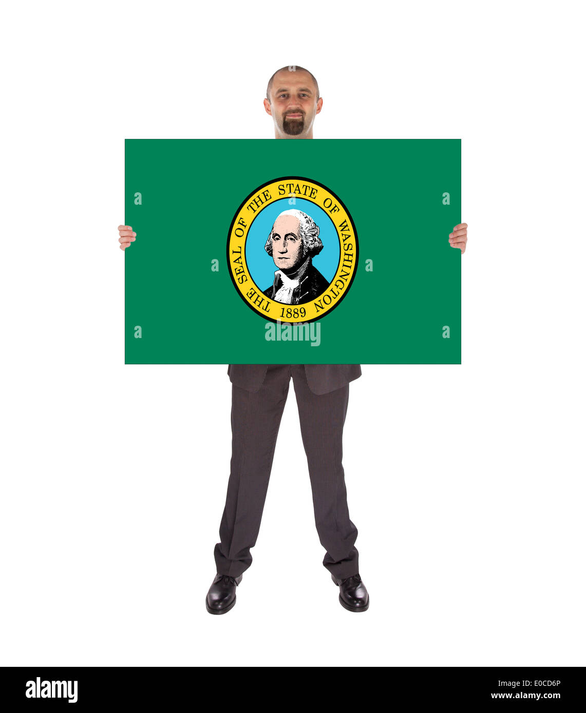 Smiling businessman holding un grand drapeau carte de Washington isolated on white Banque D'Images
