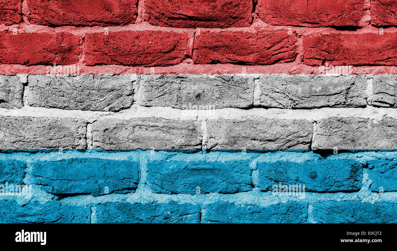 La texture du mur de brique très vieux drapeau du Luxembourg Banque D'Images