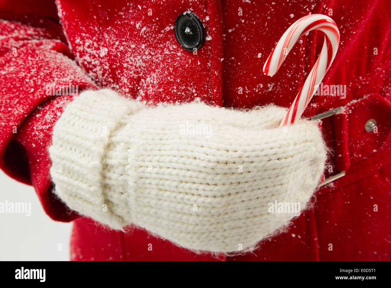 Girl (12-13) holding Candy Cane Banque D'Images