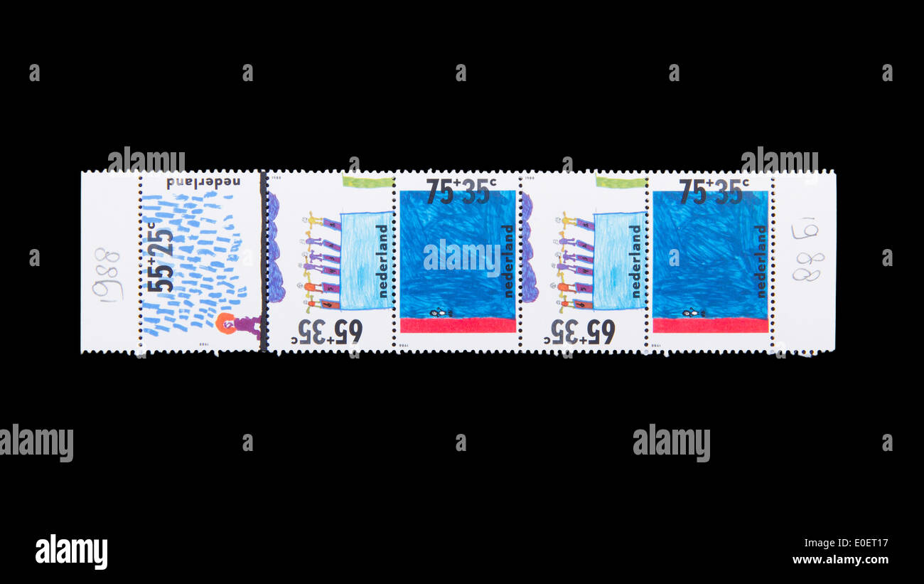 Pays-bas - circa 1980 : tampons imprimés par les Pays-Bas, montre des dessins d'enfants, vers 1980 Banque D'Images