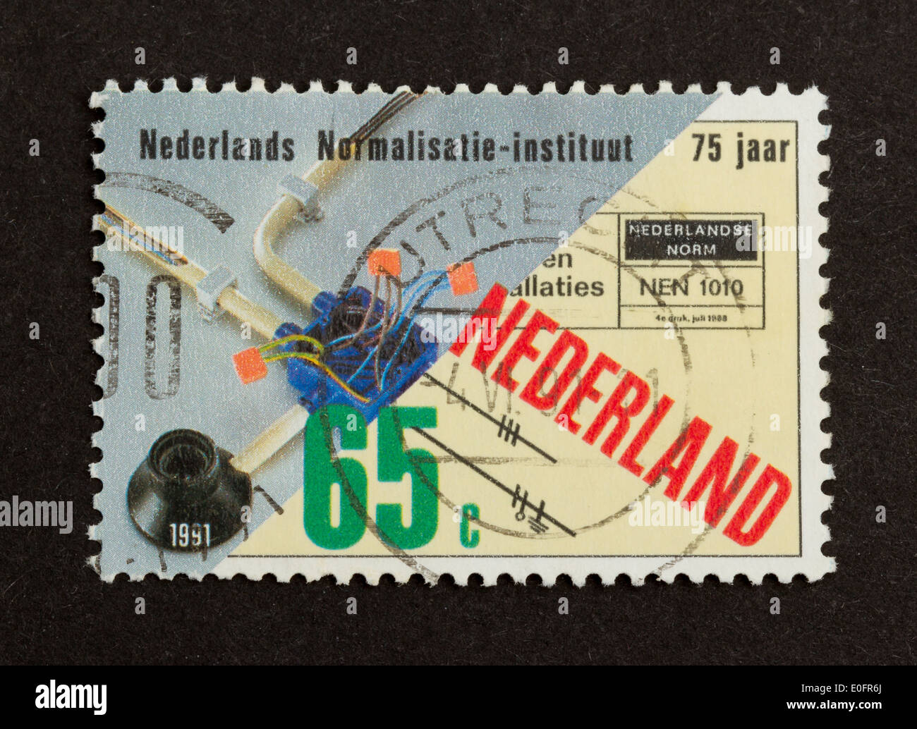 HOLLAND - circa 1990 : timbres en les Pays-Bas montre un cirquit électrique, vers 1990 Banque D'Images