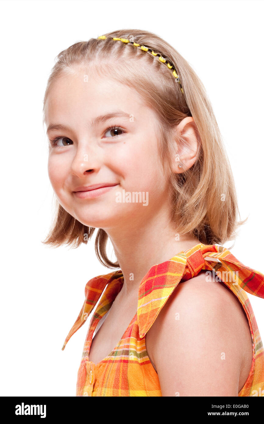 Portrait d'une petite fille aux cheveux blonds Smiling - Isolated on White Banque D'Images