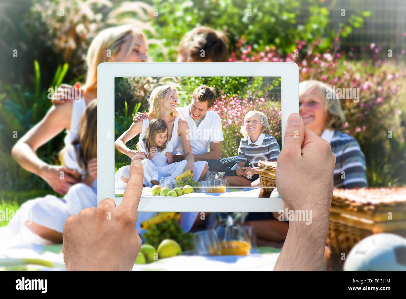 Image composite de hand holding tablet pc Banque D'Images