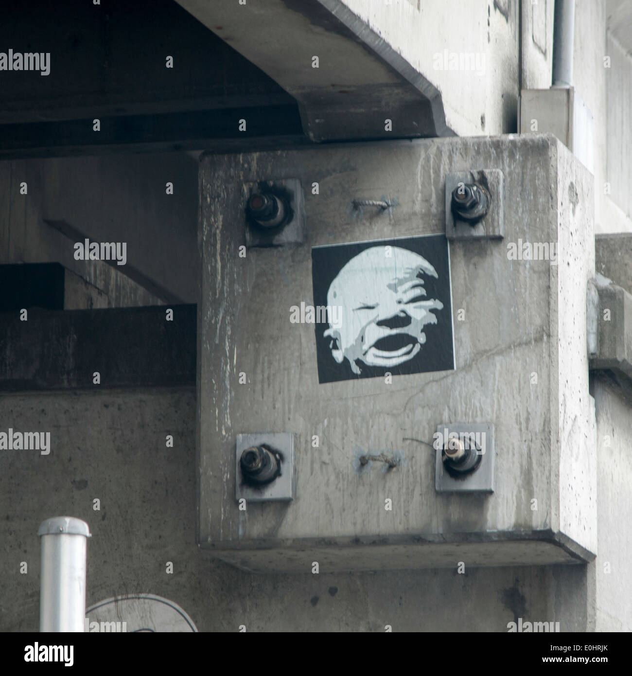 Affiche d'un visage sur un bloc de béton, Seattle, Washington State, USA Banque D'Images