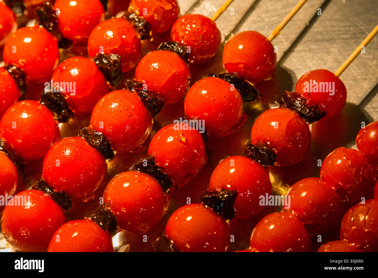 Les fruits d'aubépine revêtus par sugar Banque D'Images