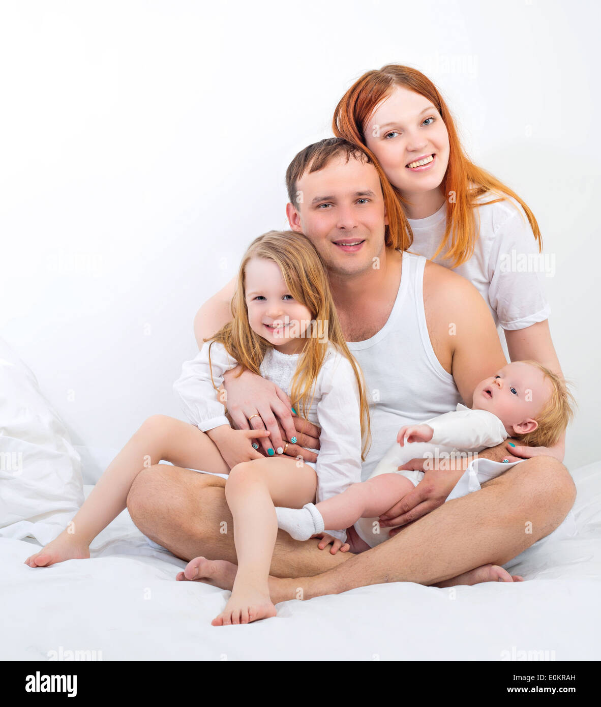 Heureux en famille avec enfants à la maison Banque D'Images
