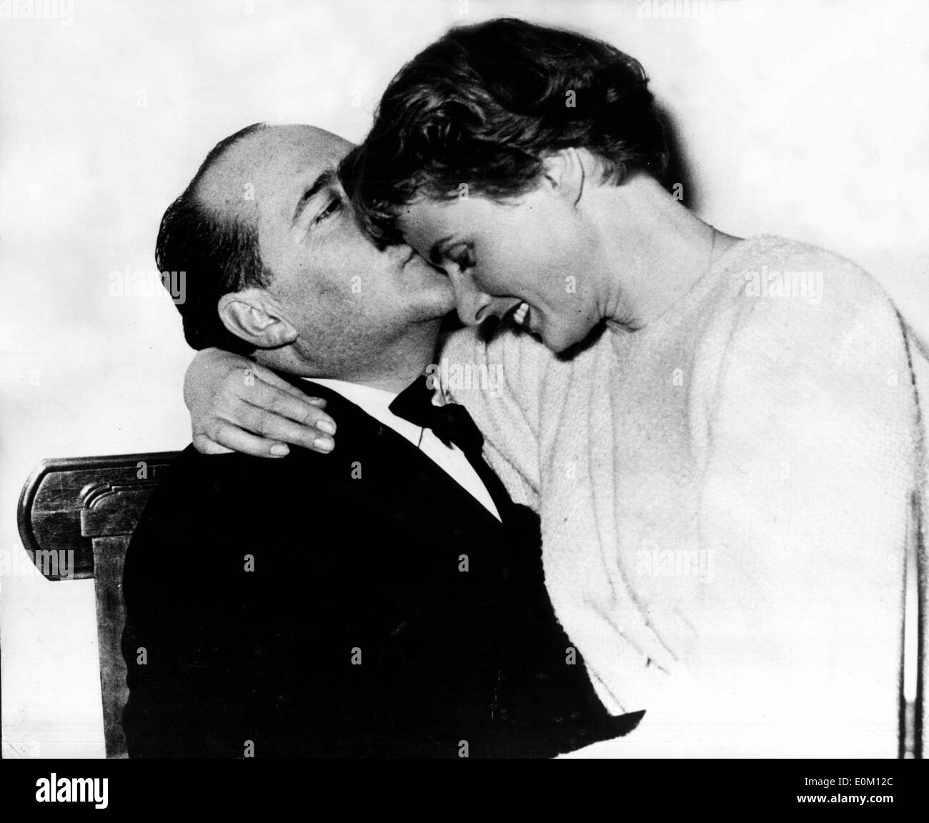 Ingrid Bergman sur son mari Robertino Rossellini's lap Banque D'Images