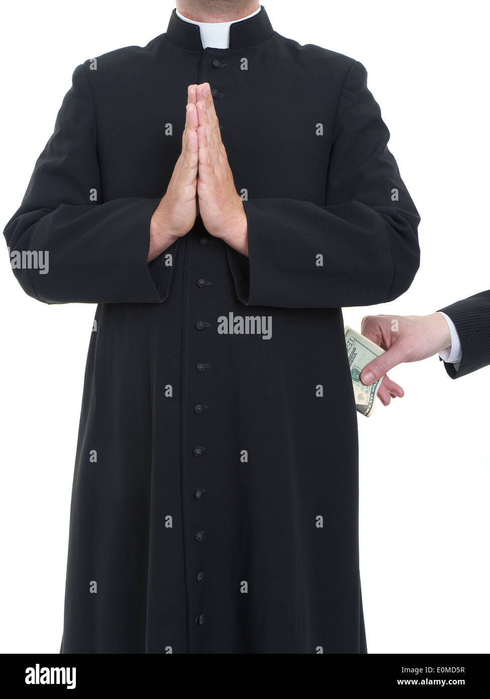 Prêtre catholique recevant pot-de-businessman Banque D'Images