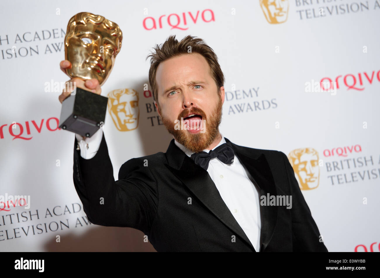 Aaron Paul pose pour les photographes dans les gagnants prix de la British Academy Television Awards. Banque D'Images