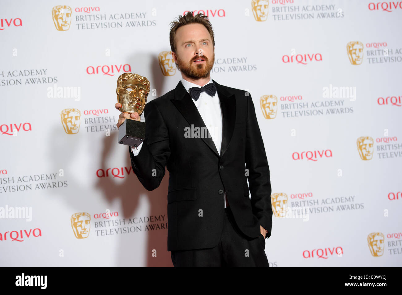 Aaron Paul pose pour les photographes dans les gagnants prix de la British Academy Television Awards. Banque D'Images