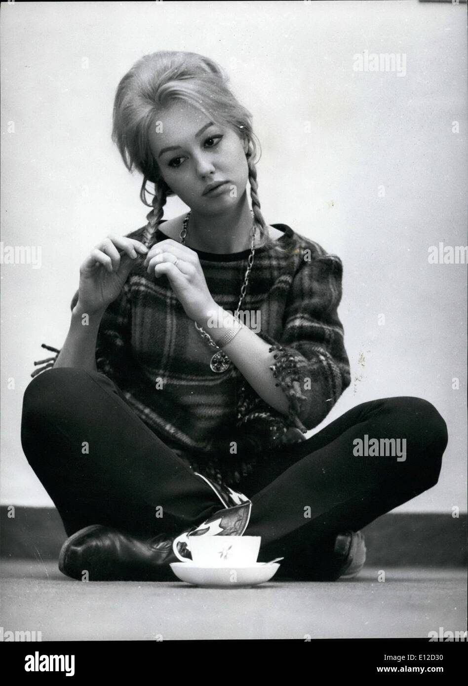 19 déc., 2011 - Demongeot : Réflexion..avec un curl. Banque D'Images