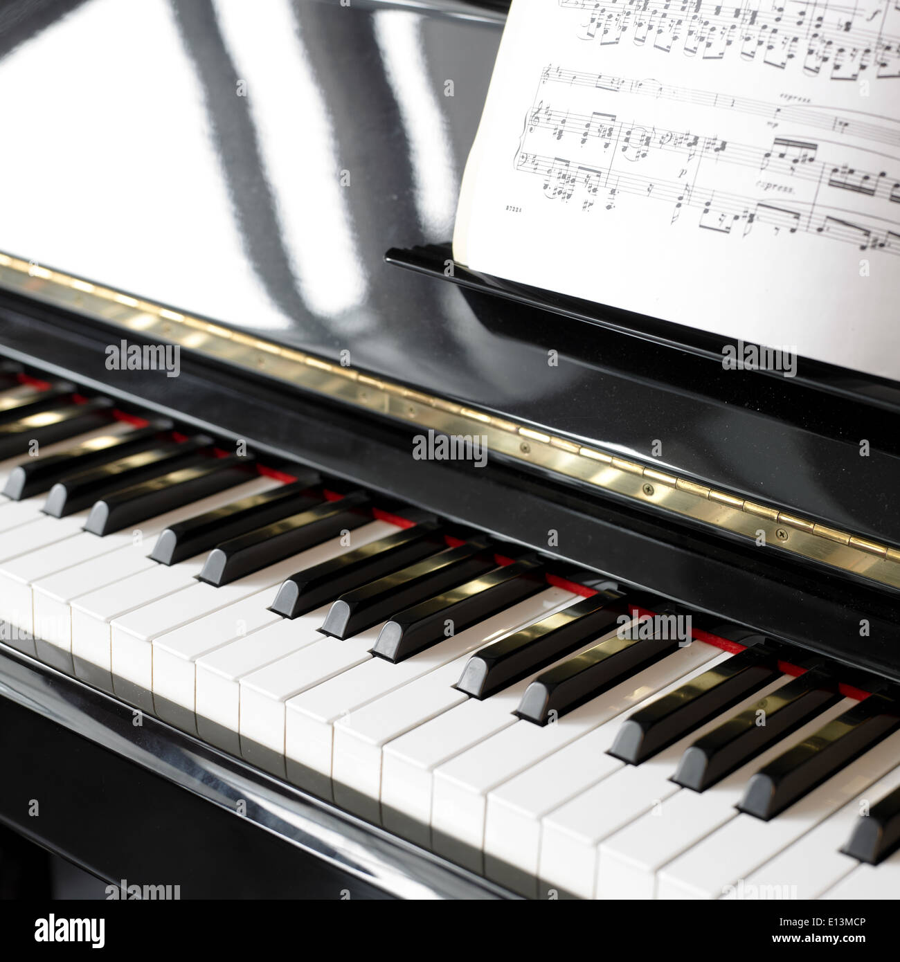 Close-up d'une note de musique et livre un piano Banque D'Images