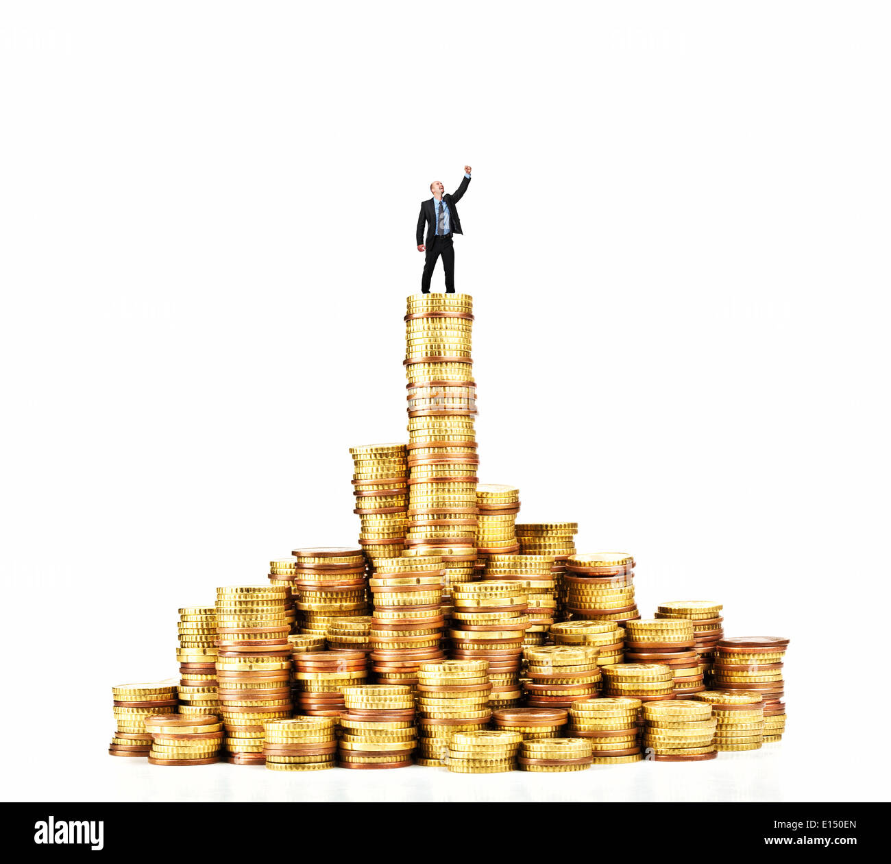 Man on pile of euro coins Banque D'Images