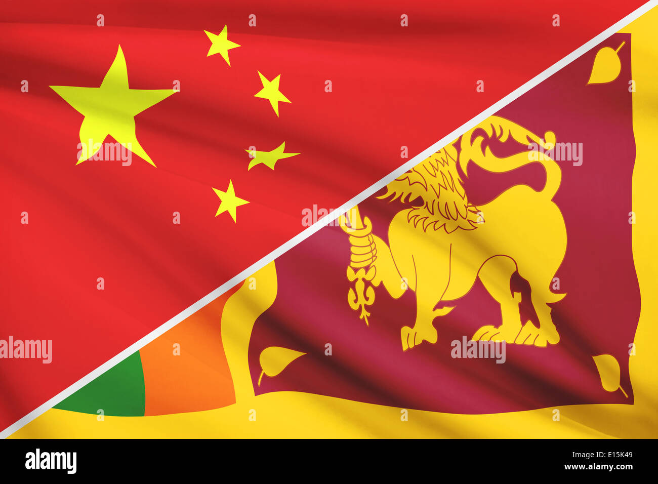 Drapeaux de Chine et République socialiste démocratique de Sri Lanka dans le vent. Partie d'une série. Banque D'Images