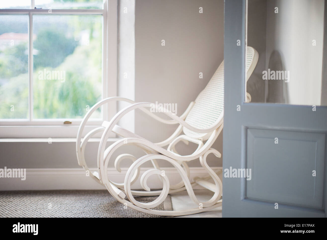 Un fauteuil à bascule à corner Banque D'Images