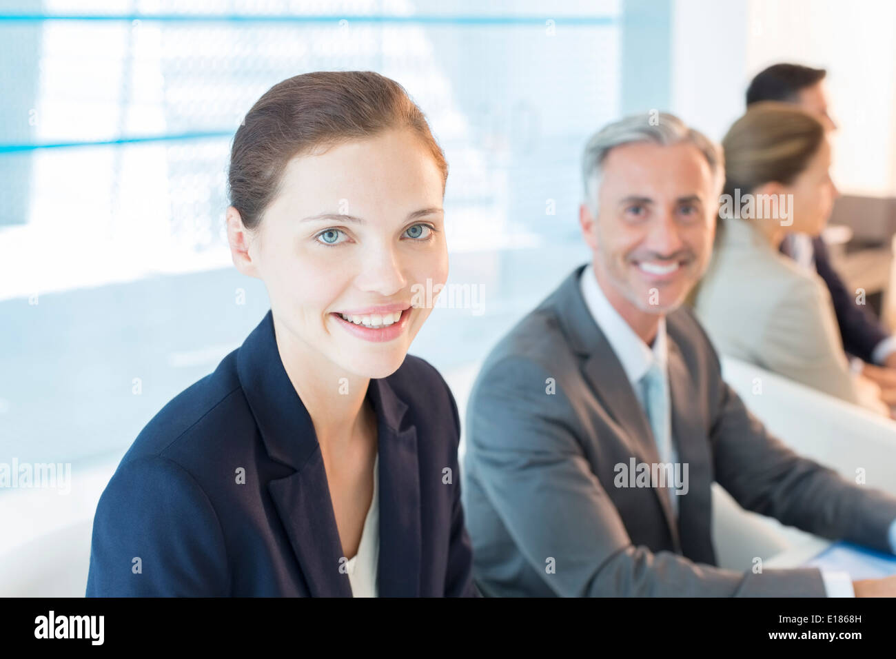Portrait of business people in conference room Banque D'Images
