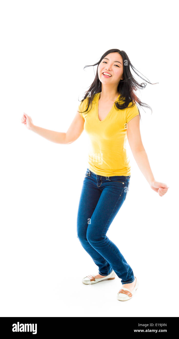 Young Asian woman dancing and smiling Banque D'Images