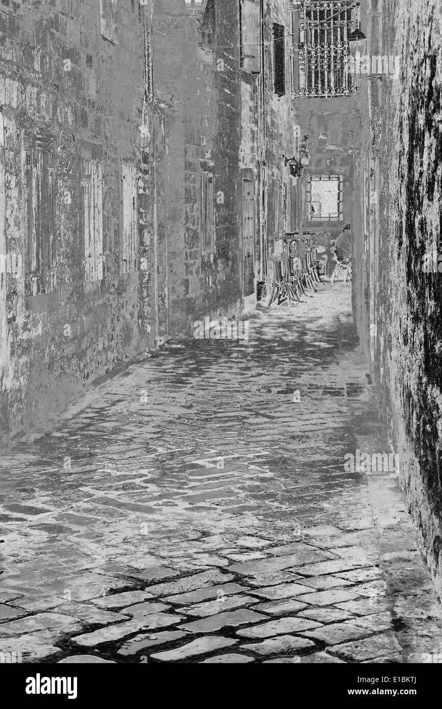 Le passage dans la vieille rue de la forteresse, la vieille ville de Kotor au Monténégro, l'art abstrait Banque D'Images
