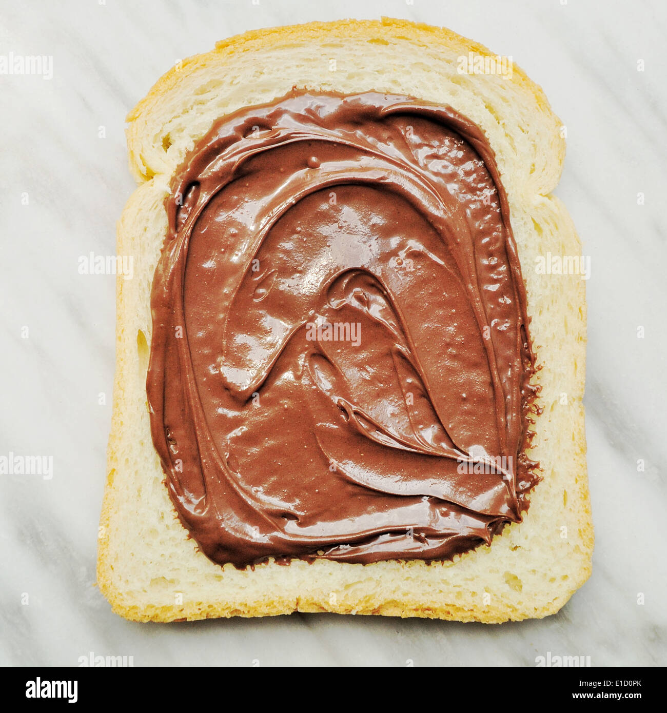 Le pain avec la crème au chocolat Banque D'Images