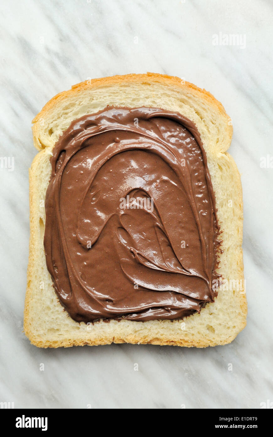 Le pain avec la crème au chocolat Banque D'Images