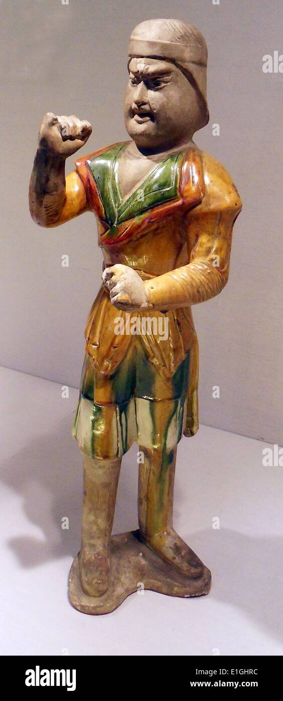 La figure d'un groom en tenue du marié d'Asie centrale, Dynastie Tang, ca. fin 7e-première moitié du 8e siècle. Faïence avec trois couleurs (de) trois couleurs glaze. Banque D'Images