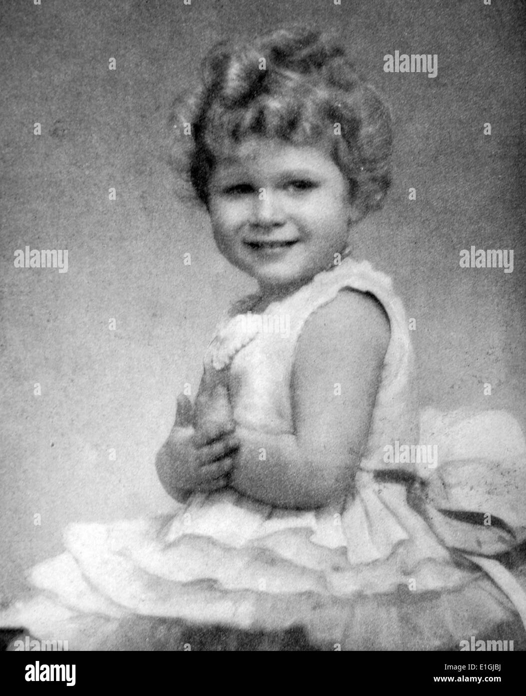 La princesse Elizabeth âgés de 3 ou 4. Plus tard Elizabeth II (Elizabeth Alexandra Mary ; né le 21 avril 1926[a]) monarque constitutionnel de 16 États souverains, connu sous le nom de royaumes du Commonwealth, et de leurs territoires et dépendances, et chef de la communauté des Nations Unies. Banque D'Images