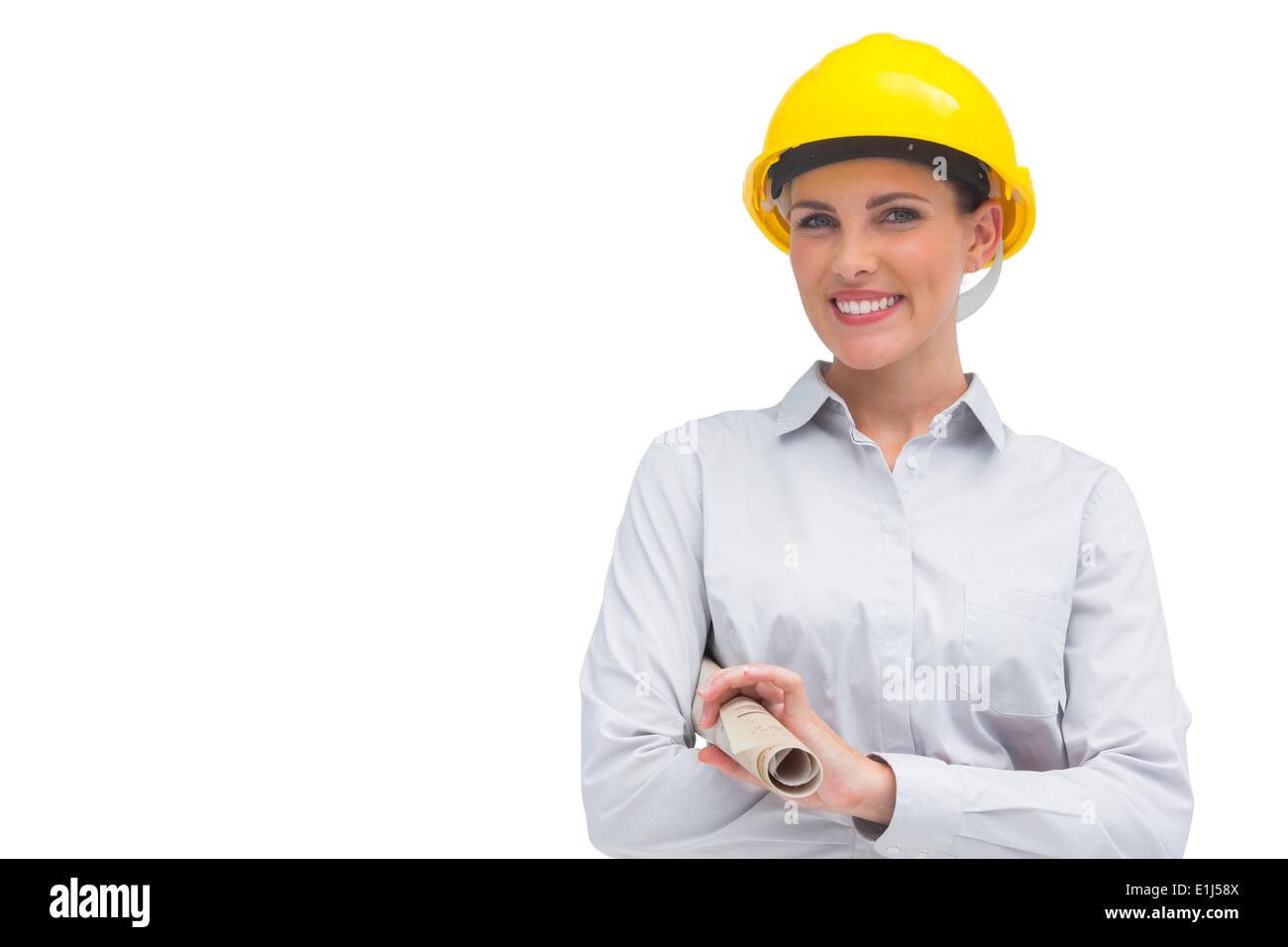 Smiling architect holding plan enroulé Banque D'Images