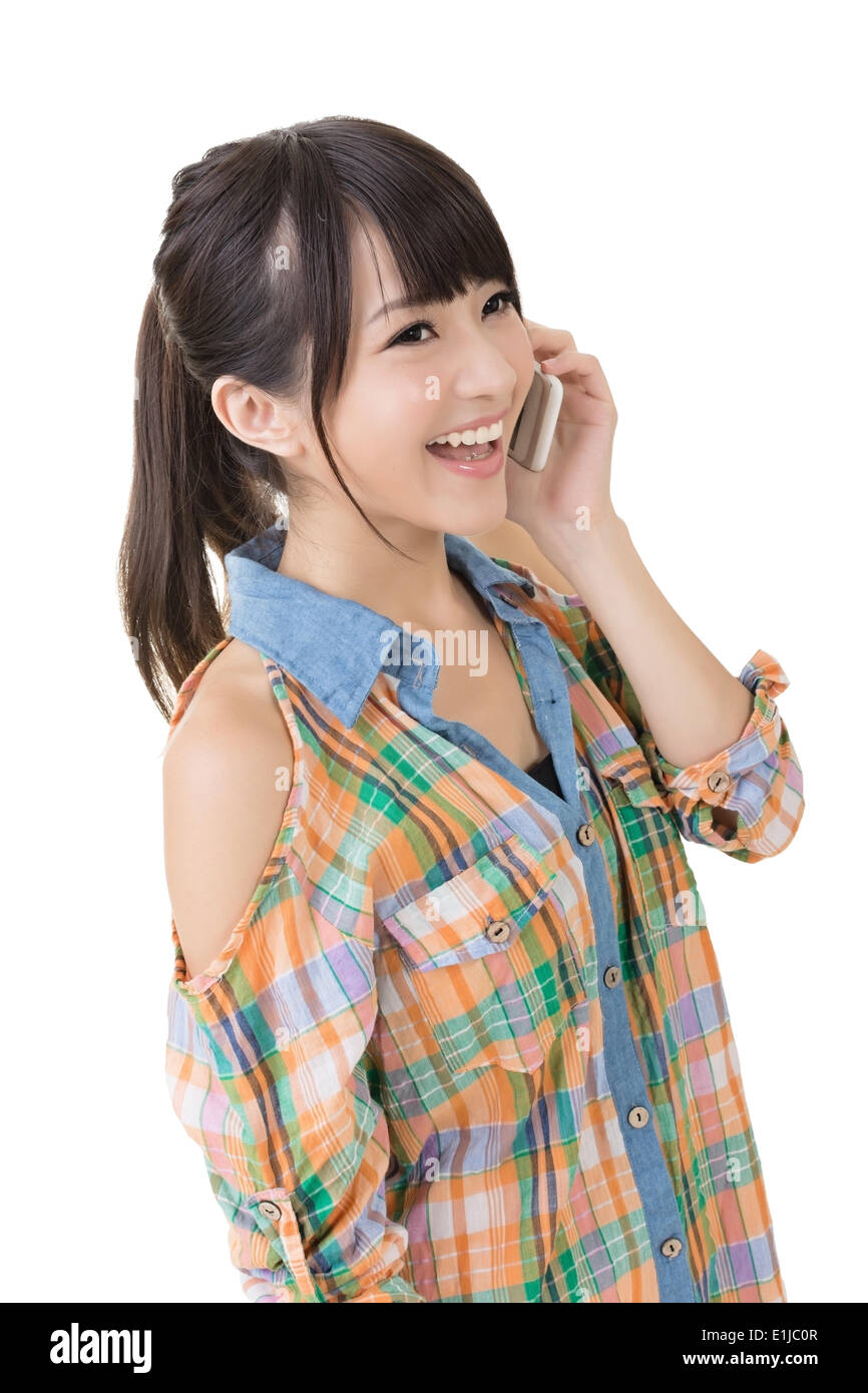 Pretty Asian Woman talking on cell phone Banque D'Images